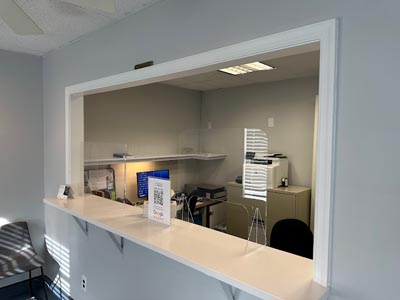check-in desk inside the waiting room at U Shine Dental